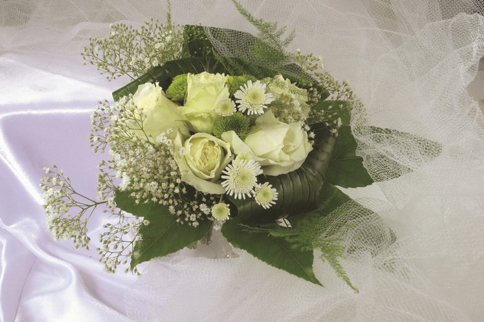 White roses and chrysanthemums bouquet with baby's breath