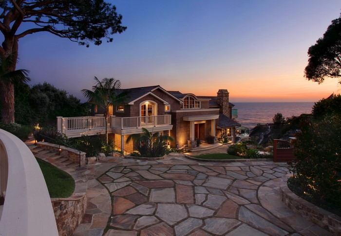 Luxury house on the coast at dusk