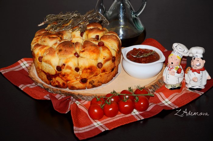 Bread with sausage and tomato sauce