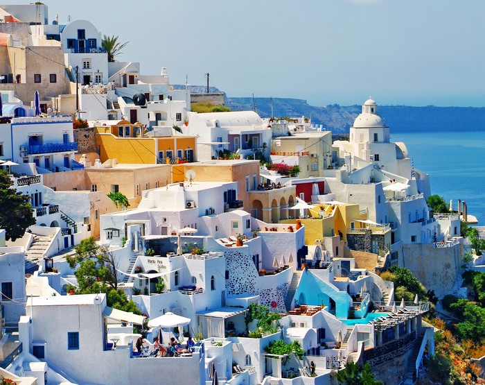 White houses on a hillside in Santorini, Greece