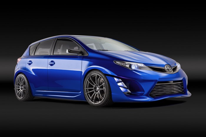 Blue Scion iM with custom wheels