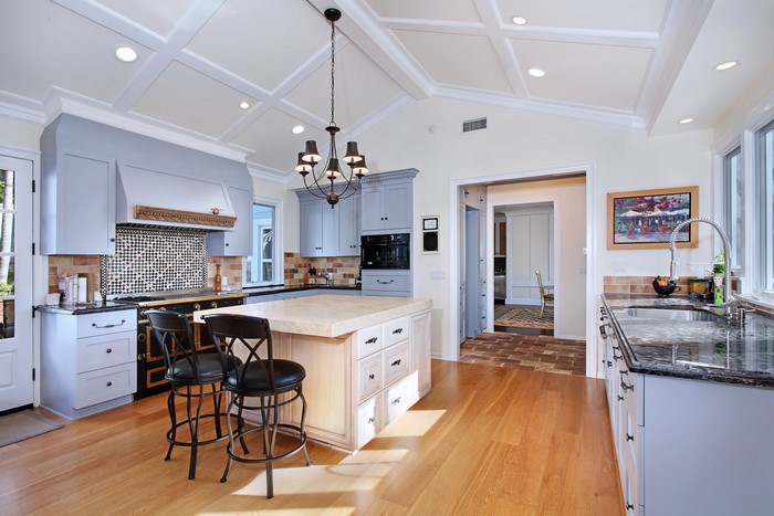 Kitchen with Chandelier and Chairs