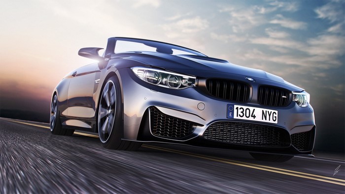 BMW M4 Convertible driving on a road