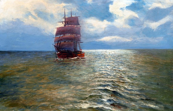 Sailing ship on the ocean under a cloudy sky
