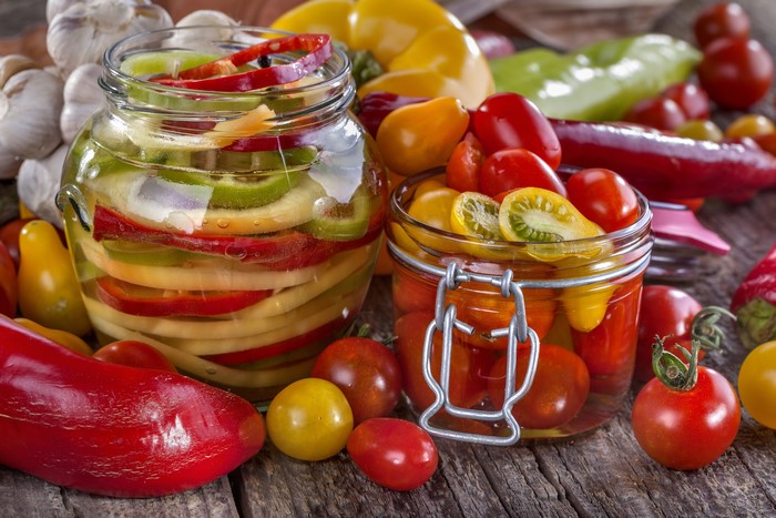 Pickled Vegetables and Tomatoes in Jars