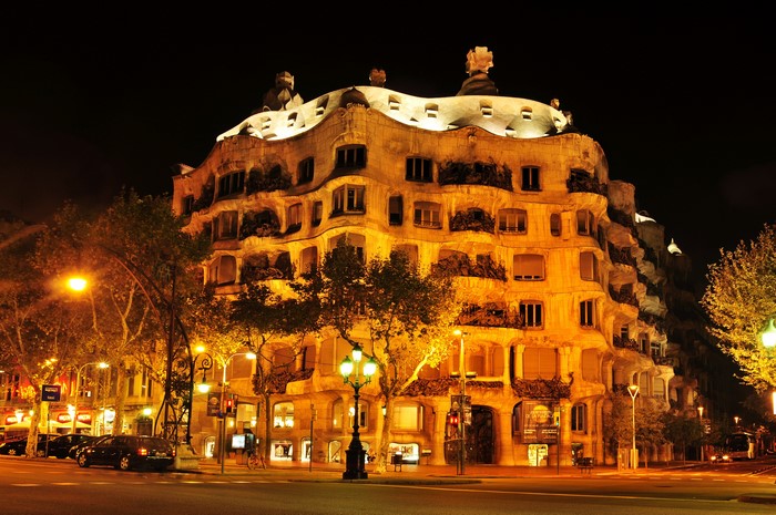Casa Mila building at night in Barcelona, Spain