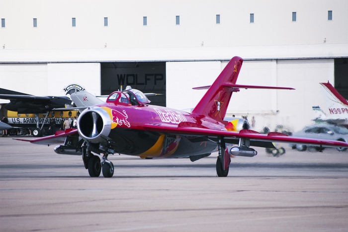 Red Bull Mig-17 Fresco fighter jet on tarmac