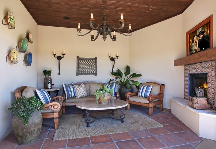 Living room with fireplace and chandelier