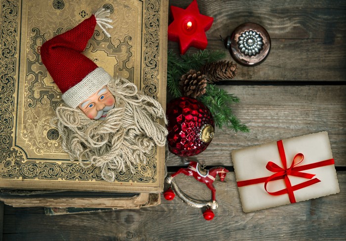 Christmas Decorations on Wooden Surface with Santa Claus