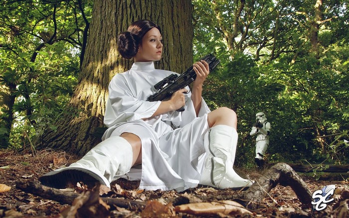 Princess Leia from Star Wars with Stormtrooper in forest