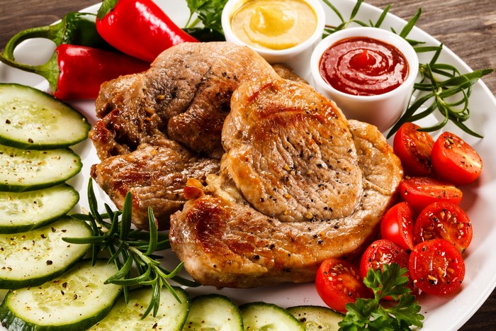 Meat products with tomatoes, cucumbers, and bell peppers