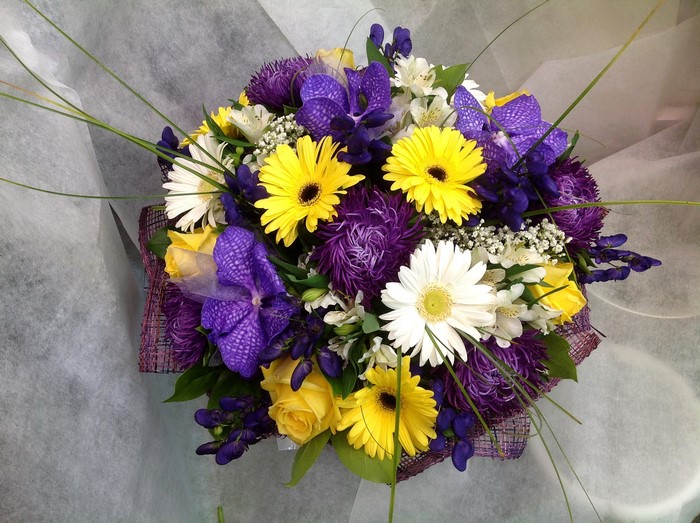 Purple, yellow, and white flower bouquet