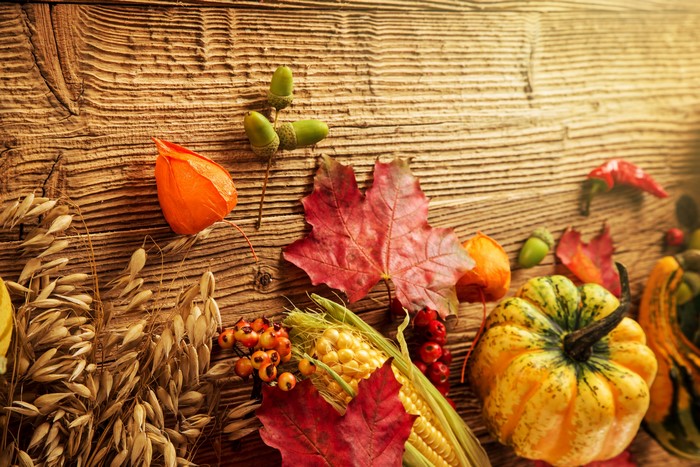 Autumn Harvest Display with Pumpkins and Corn