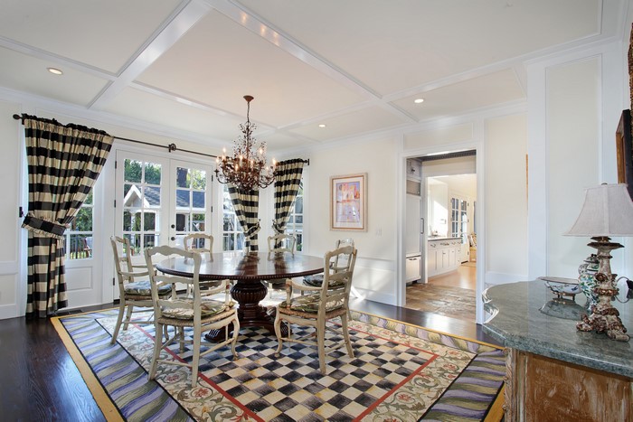 Dining Room with Chandelier and Carpet