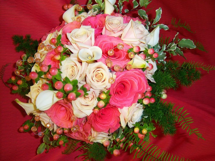 Pink and cream rose bouquet with calla lilies and berries