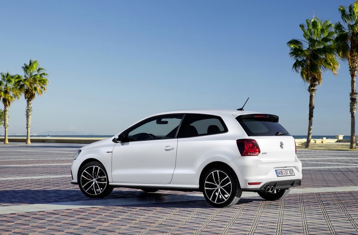White Volkswagen Polo GTI parked by the sea