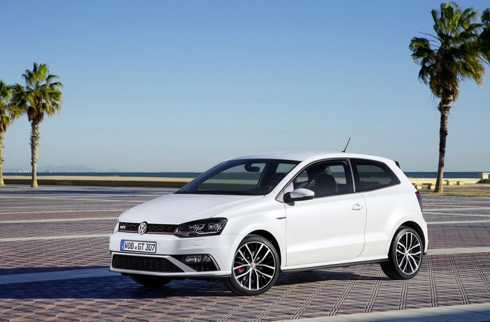White 2014 Volkswagen Polo GTI by the ocean