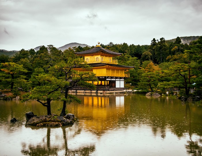 Golden Pavilion in Kyoto, Japan, reflected in a pond