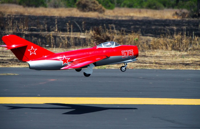 Red Mig-15 Fighter Airplane with Stars