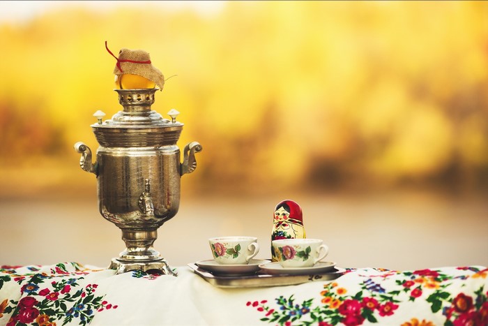 Samovar with tea cups and Matryoshka doll