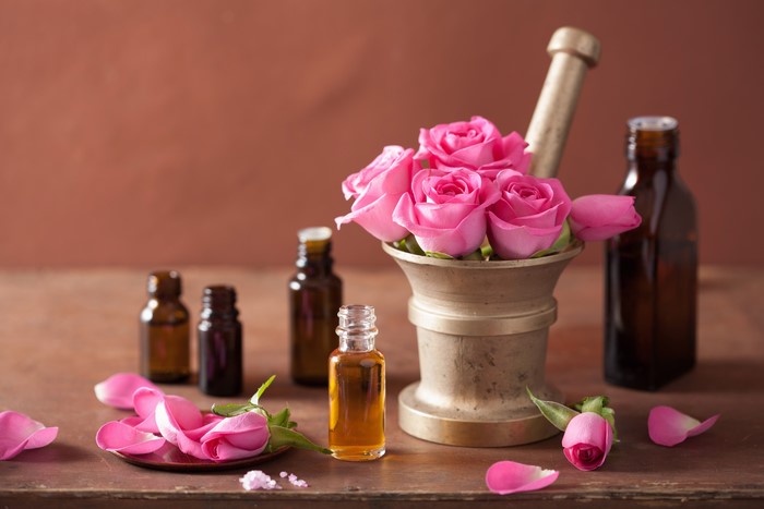 Pink Roses and Essential Oil Bottles