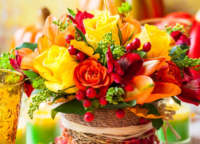 Autumn bouquet with roses and berries