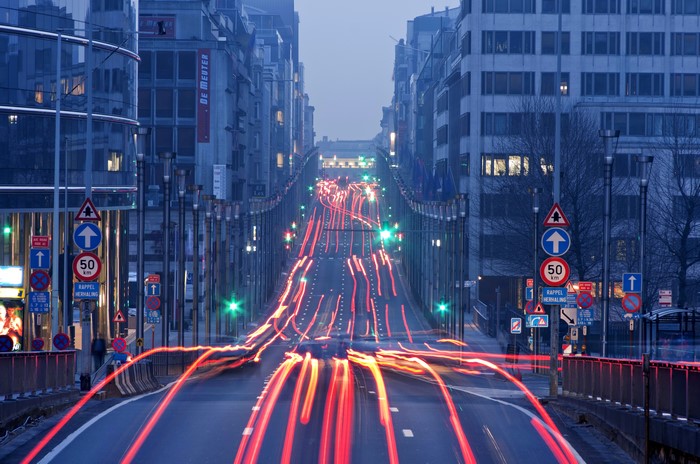 City street with light trails at night