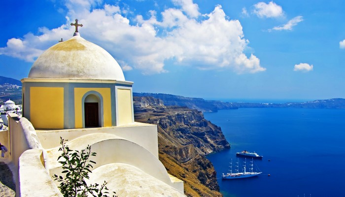 Church dome overlooking the sea in Santorini, Greece