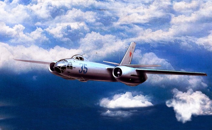 IL-28 Beagle bomber flying through clouds