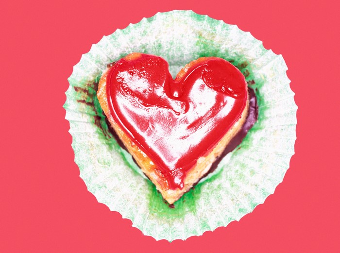 Heart-shaped cupcake with red frosting