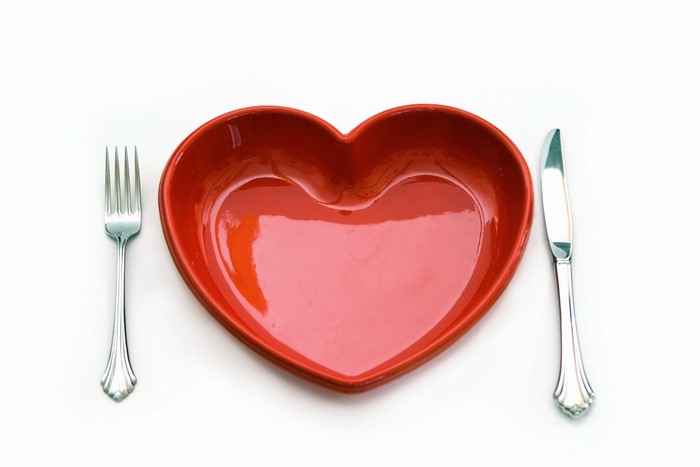 Heart-shaped plate with fork and knife