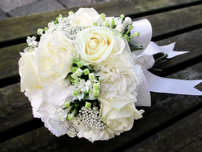 White wedding bouquet with roses and carnations