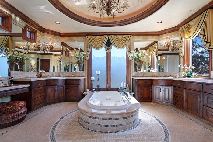 Luxurious bathroom with jacuzzi and chandelier