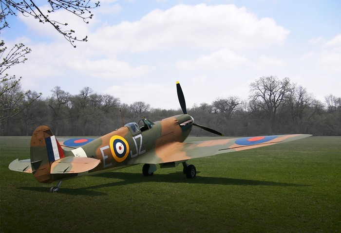 Supermarine Spitfire Mk I airplane on a grassy field