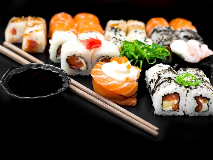 Sushi with chopsticks and soy sauce