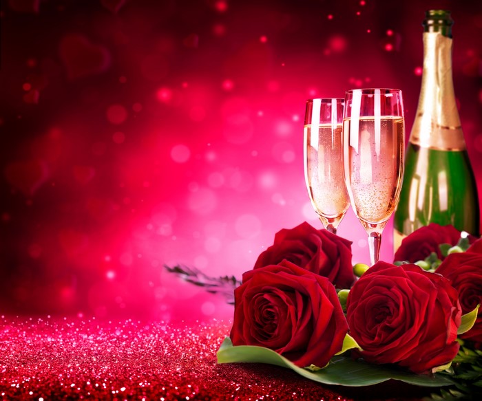Champagne bottle and glasses with roses