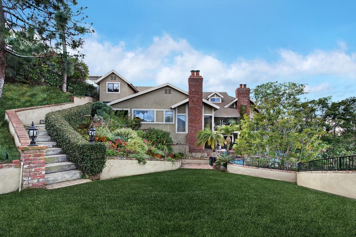 House with lawn and stairs