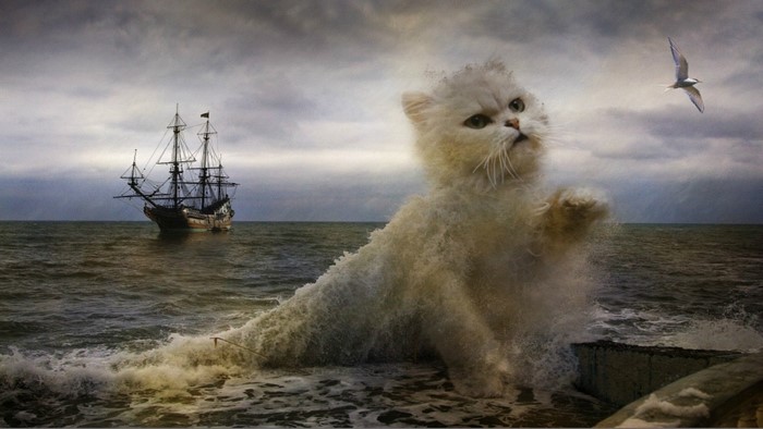 Giant cat emerging from waves near a ship