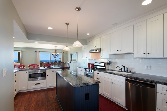 Modern kitchen with island and ocean view