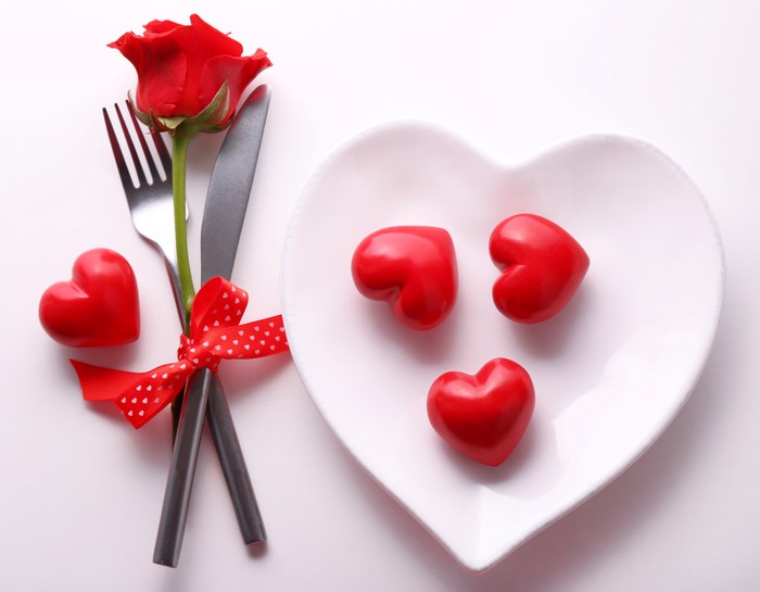 Valentine's Day Table Setting with Rose and Heart Chocolates