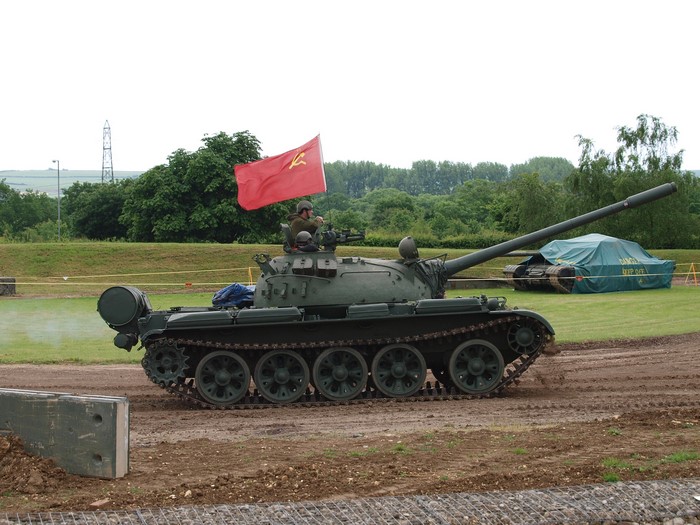 Soviet T-54 tank with red flag