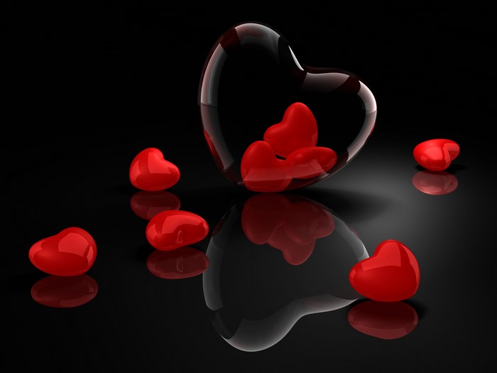 Red Hearts in a Glass Heart Container