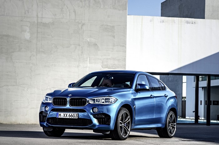 Blue 2015 BMW X6 M parked outdoors