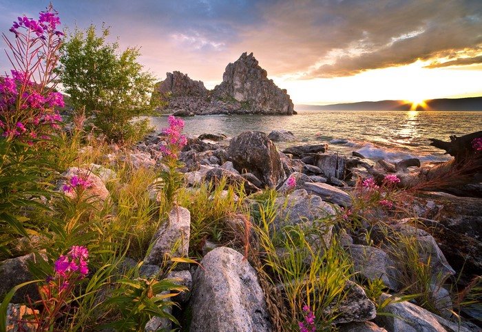 Shamanka Rock on Lake Baikal, Russia at sunset