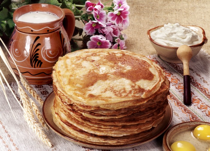 Stack of Pancakes with Milk and Eggs