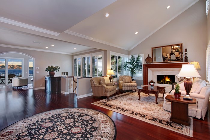 Living room with fireplace and ocean view