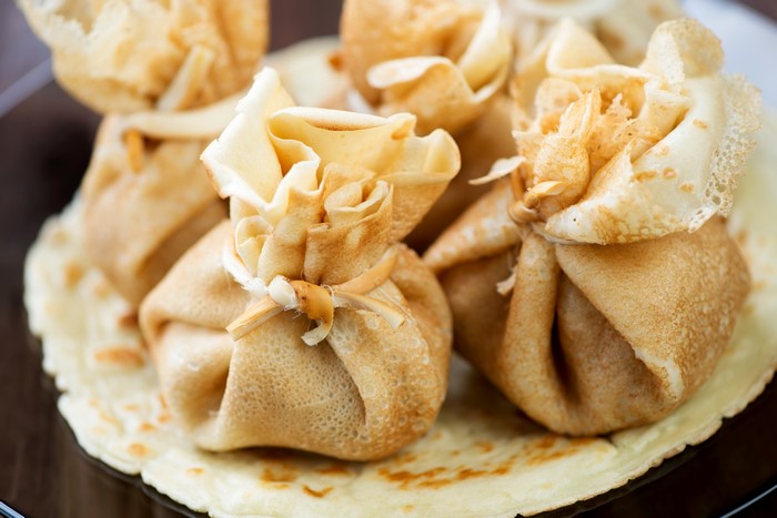 Pancakes filled and tied like little bags