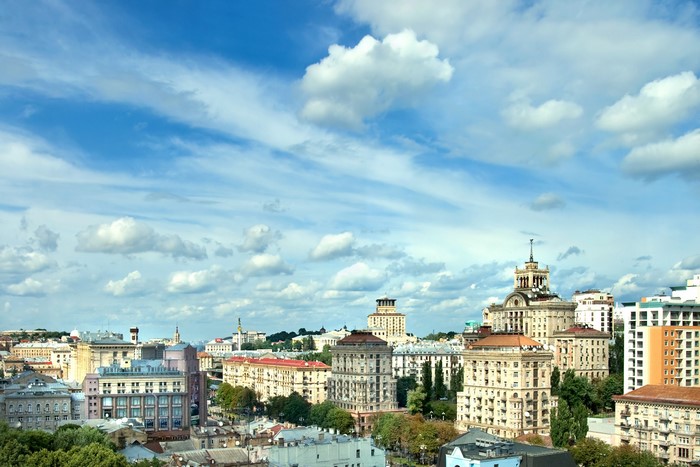 Cityscape of Kiev, Ukraine with buildings and clouds