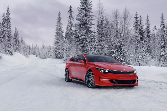 Red 2015 Kia Sportspace concept car in winter