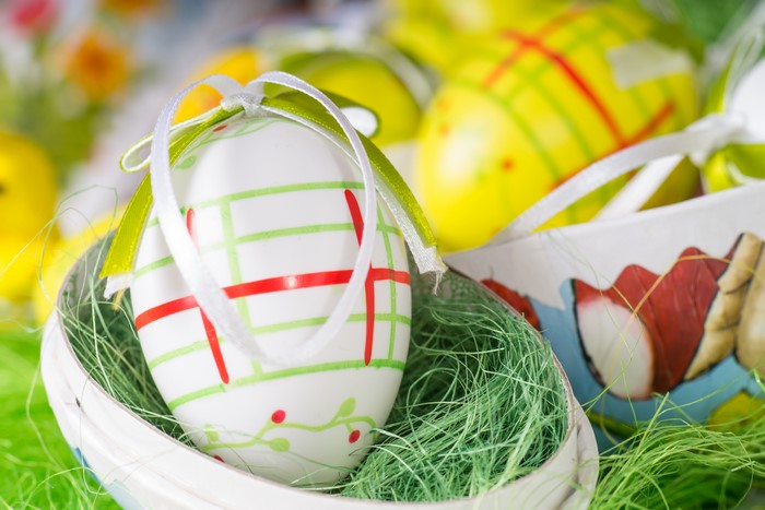 Easter Eggs in a Basket with Green Grass